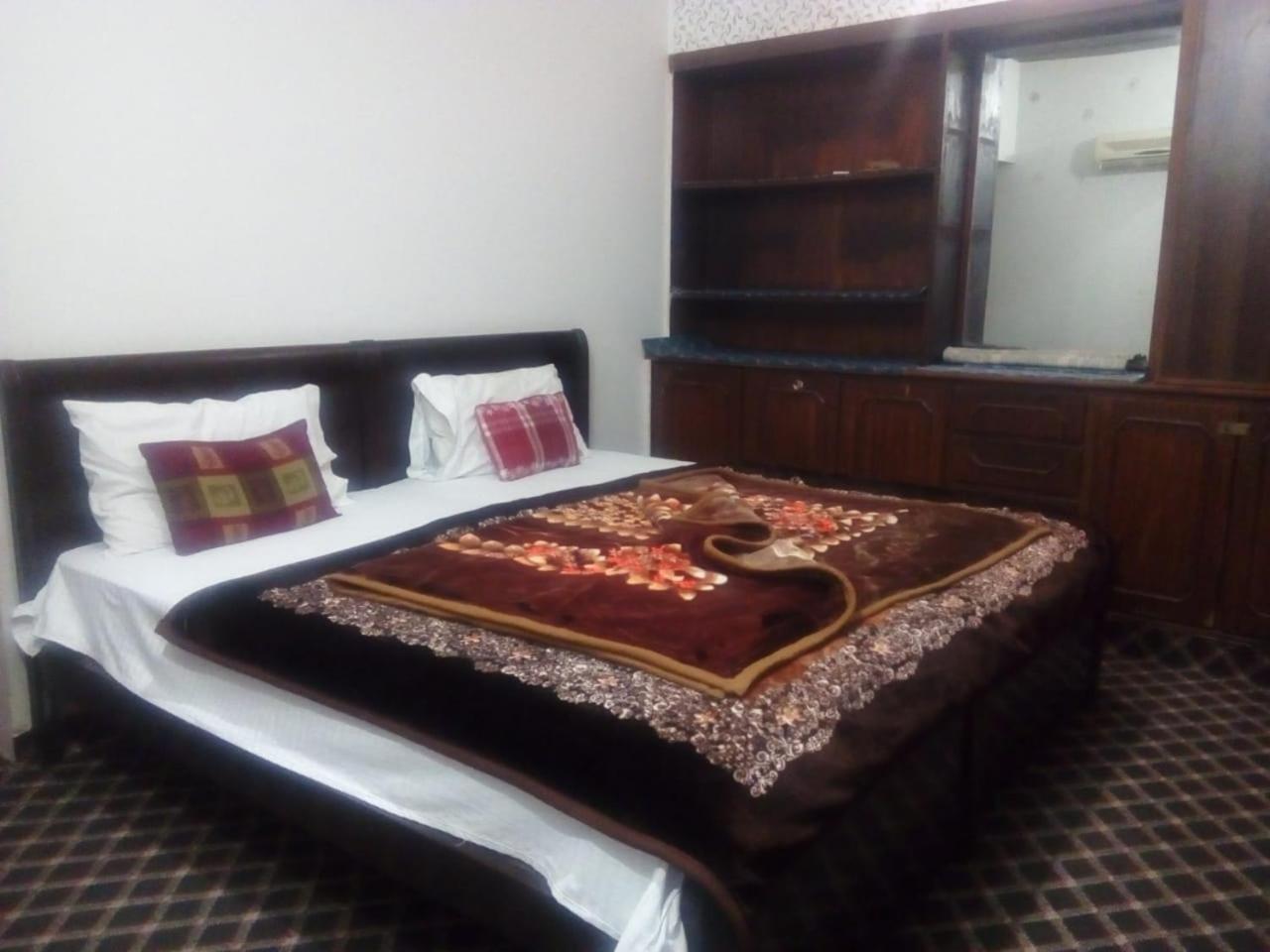 New City Lodges Guesthouse Islamabad Kamer foto